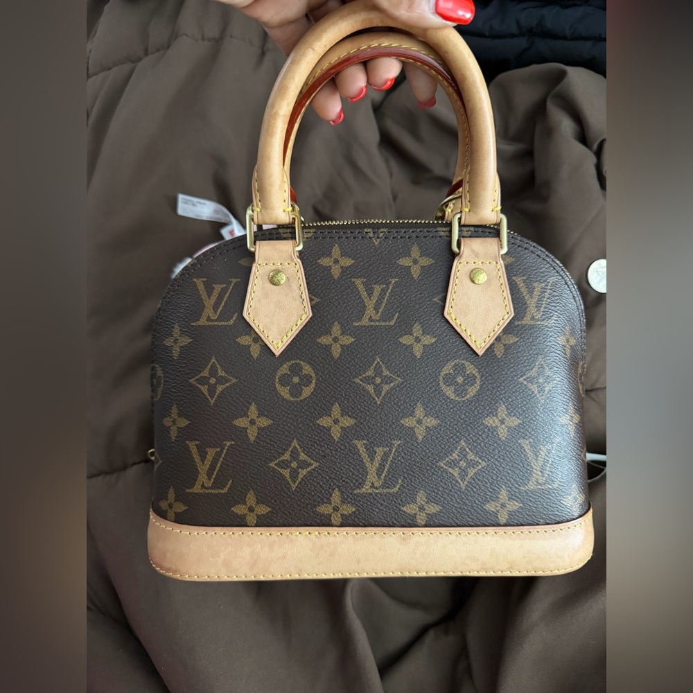 Louis Vuitton Monogram Brown Alma Handbag